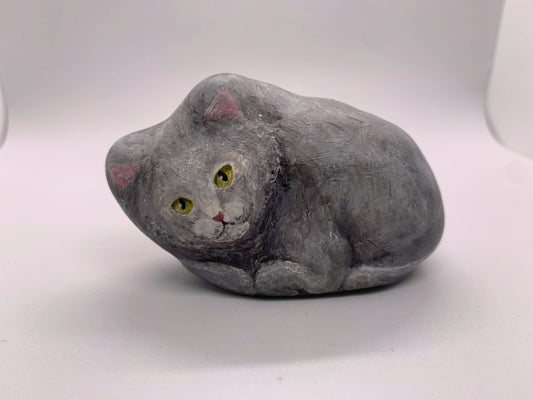 Paper mache cat (covered in ash)